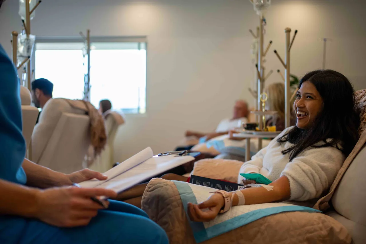 Patient relaxing during a vitamin IV therapy session at the Gold Coast clinic